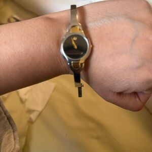 Movado Silver, Gold and Black classic bracelet watch